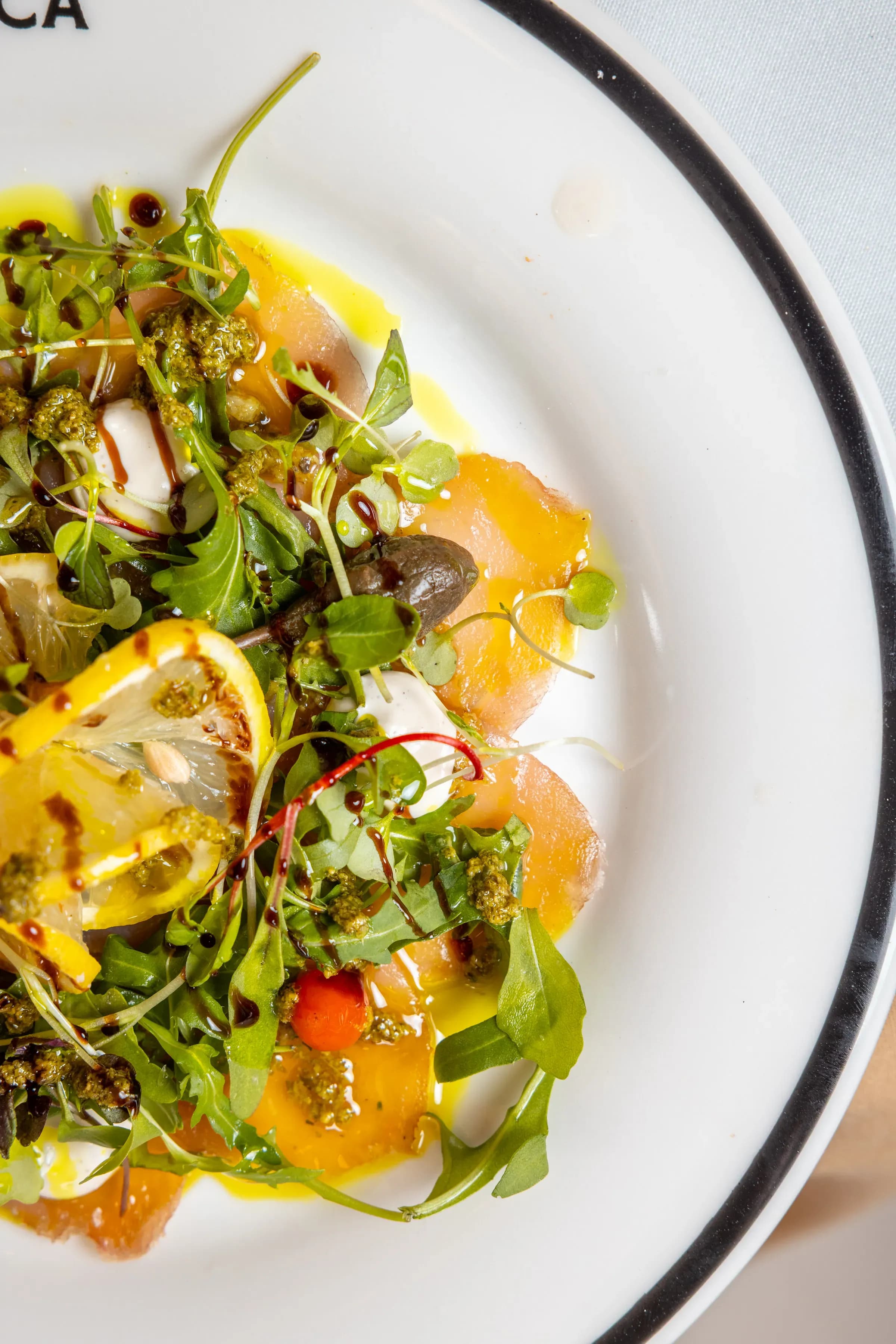 Salmon carpaccio with citrus dressing